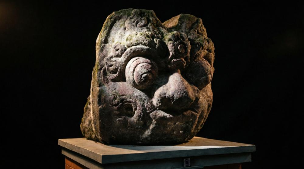 REPRESENTASI KALA Dalam Arca Kepala Batu